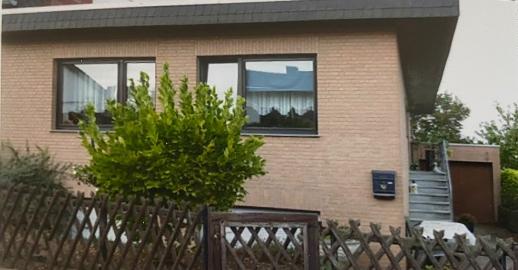 Einfamilienhaus mit ungedämmter Klinkerfassade vor der energetischen Sanierung